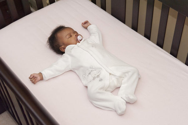 Baby not sleeping in hot sale cot